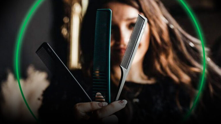 Paul Mitchell Schools Student holding combs in foreground to show confidence in her tools.