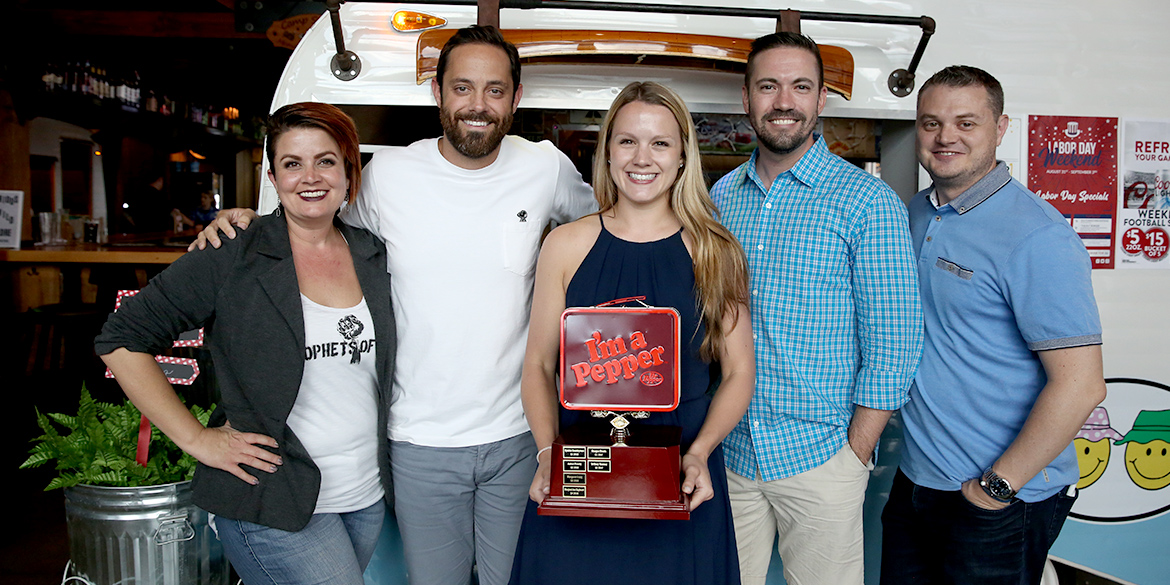 Pepper award winner with executive team